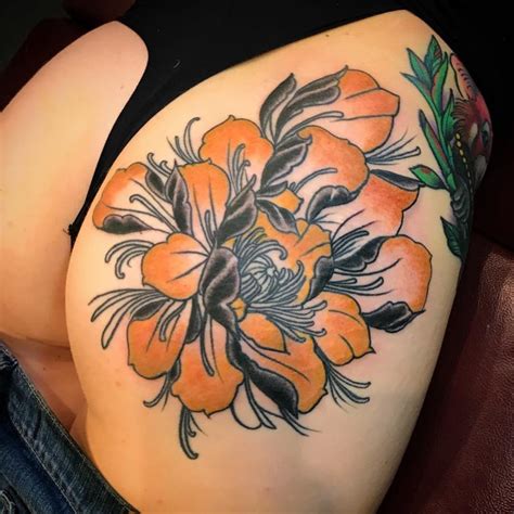 floral butt tattoo|Elegant Flower Tattoo Designs for Buttocks